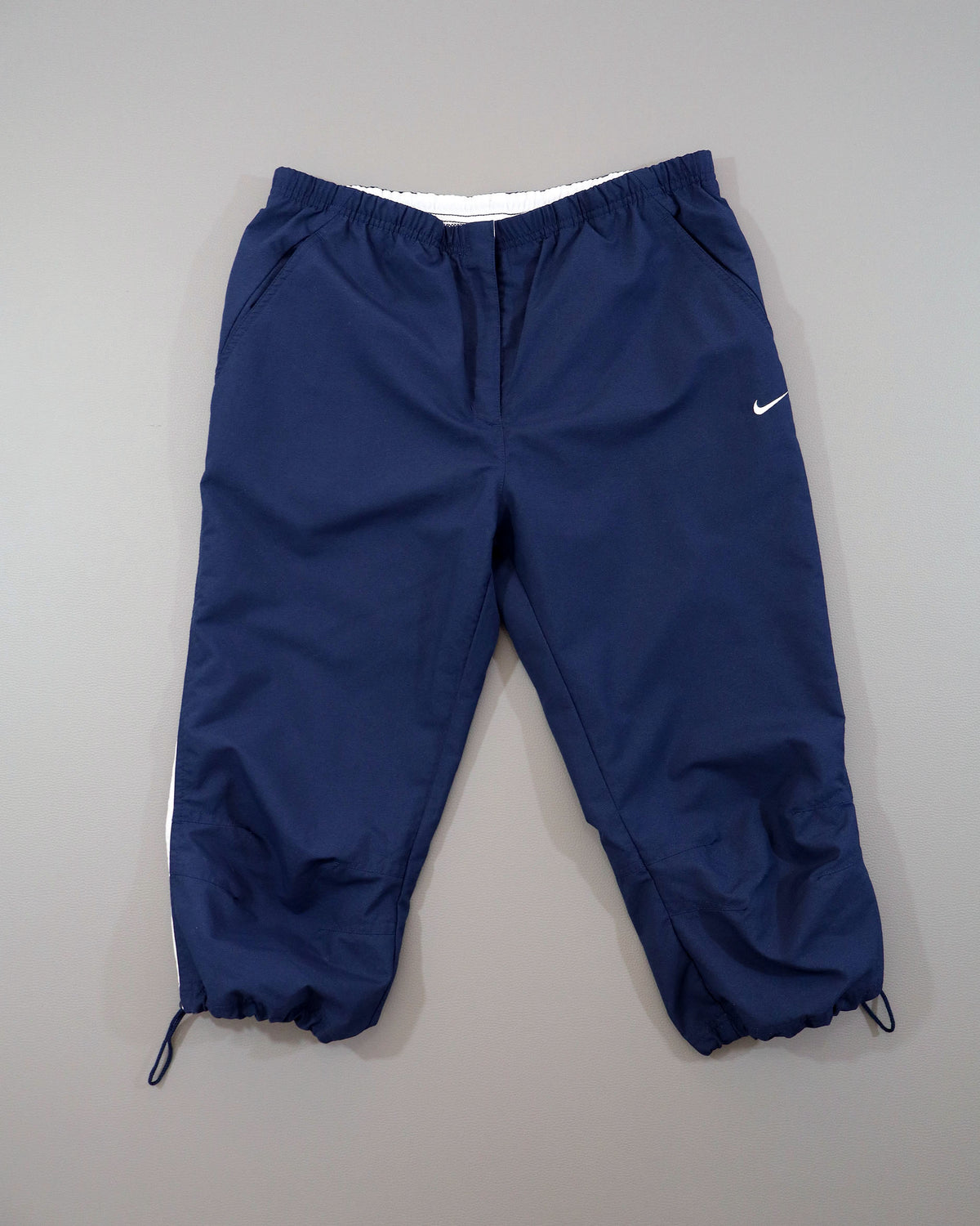 Nike ženske šuškave pantalone 3/4 - L