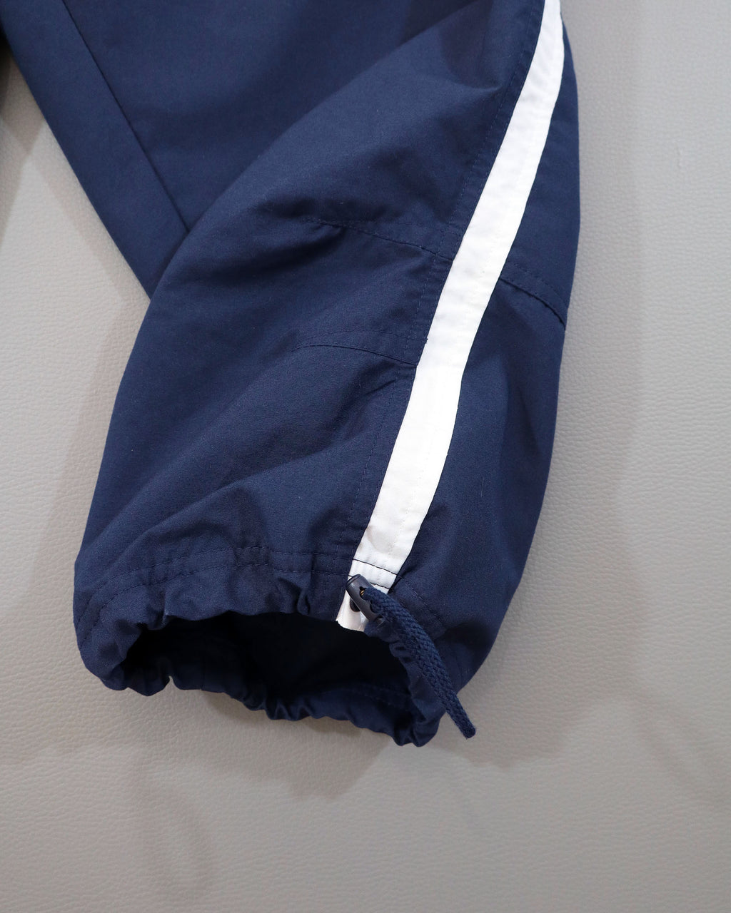 Nike ženske šuškave pantalone 3/4 - L