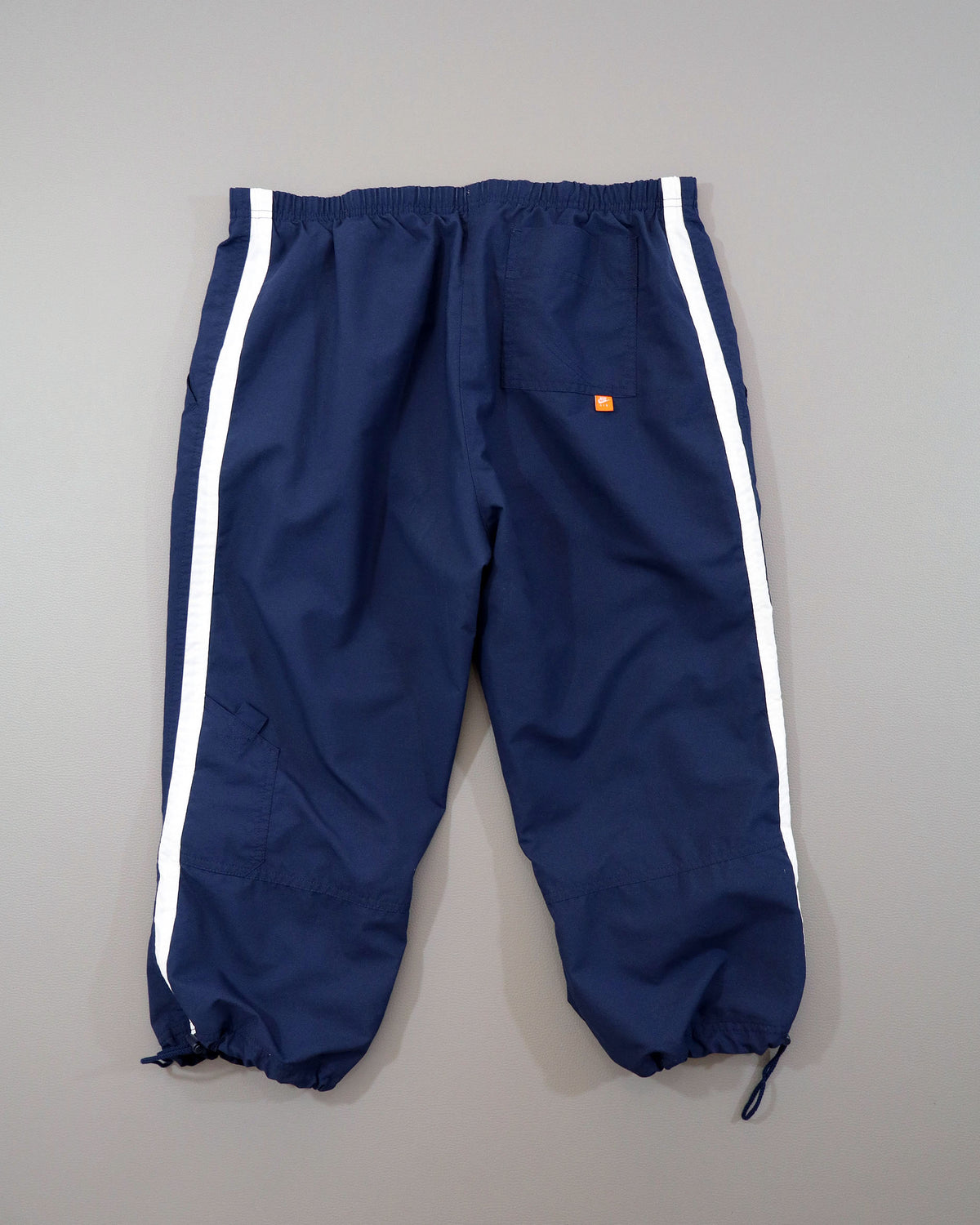 Nike ženske šuškave pantalone 3/4 - L